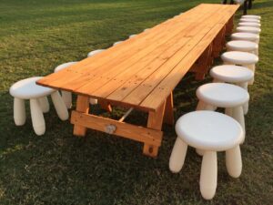 Stools with natural wooden tables