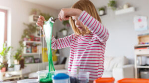 girl making slime at slime station